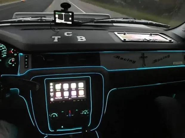 Custom dash with EL wire accent lighting and an aftermarket touchscreen head unit