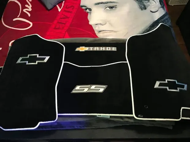 Custom embroidered floor mats with Chevrolet bowtie and SS lettering